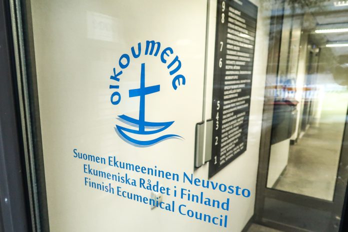 Lasiovi, jossa teksti Suomen Ekumeeninen Neuvosto