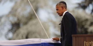 Shimon Peres haudan lepoon mittavien turvatoimien saattelemana