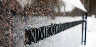 Lumilautailijan temppuilu hautamuistomerkin päällä mainosvideossa pöyristyttää Kempeleessä