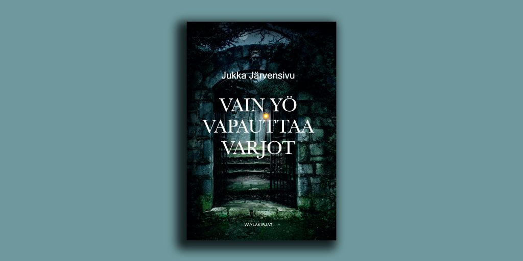 kuvassa keskellä kirjan kansi