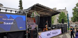 Oulun Diakonissalaitoksen Säätiön puistojuhlaa ei sade latistanut esiintymislavalla rap-yhtye