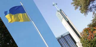 Lauttasaaren seurakuntalaiset saavat suorat yhteydet Ukrainaan ja pääsevät kehittämään tukitoimia Kuvassa on Ukrainan lippu tangossa ja Lauttasaaren kirkontorni.